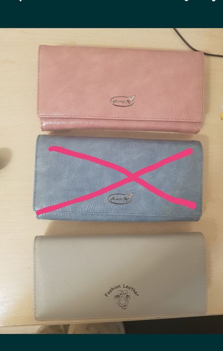 Кошельки продаю новые