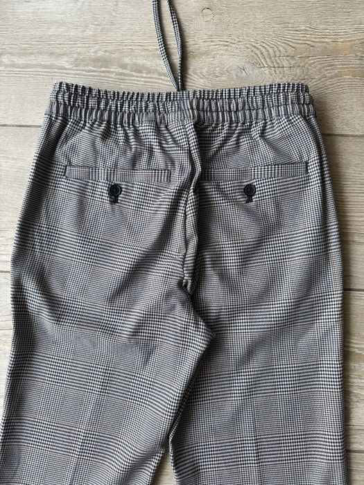 Męskie spodnie H&M w kratę rozm. XS