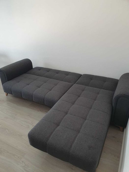 Sofá-cama com arumação
