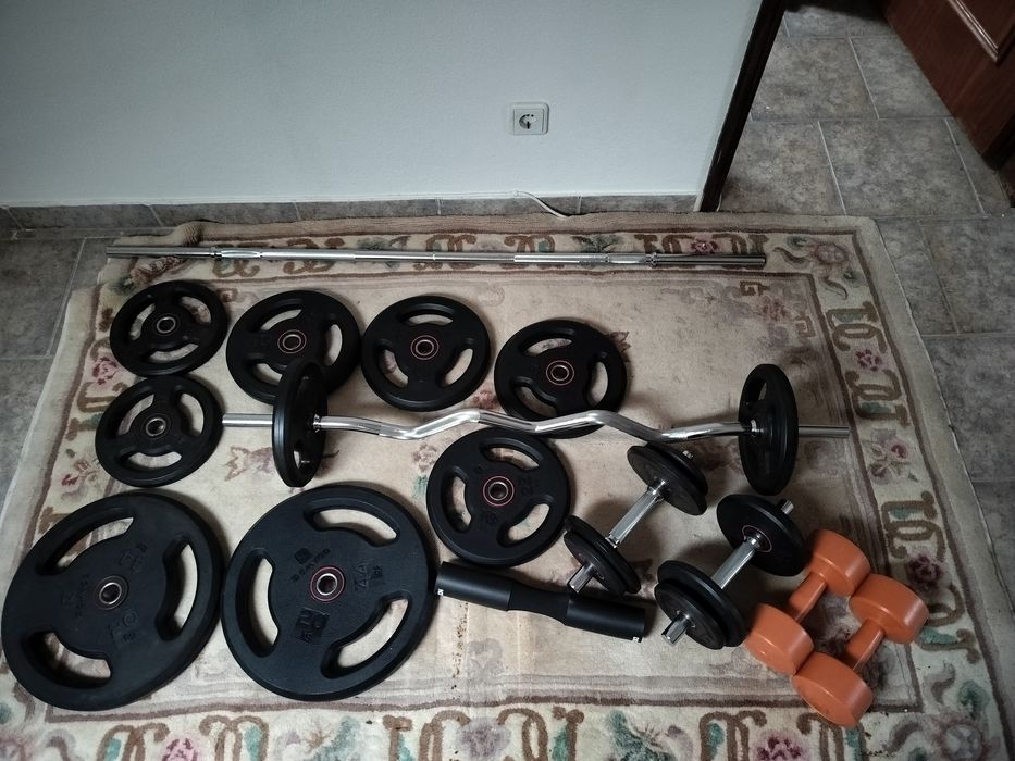 Discos de borracha barras e halteres