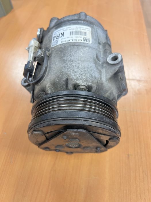 Компресор кондиціонера  Опель Астра Н