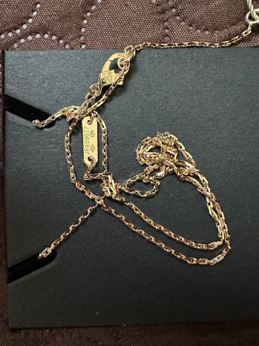 Złoty naszyjnik Van Cleef & Arpels Alhambra z czarnym środkiem