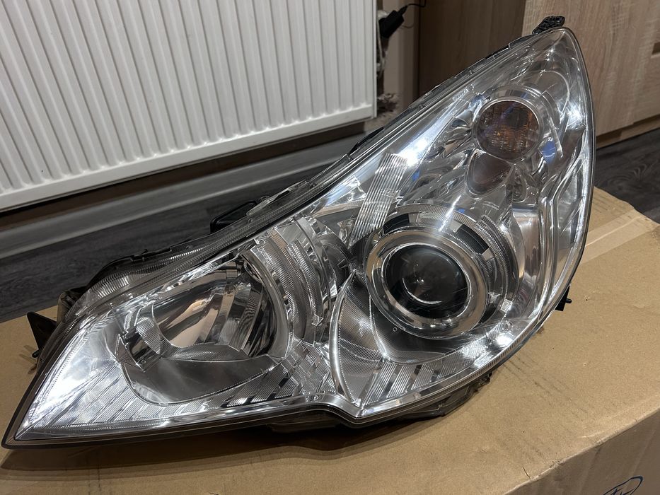 Lampa lewa 84001AJ111 subaru outback legacy europa kpl xenon