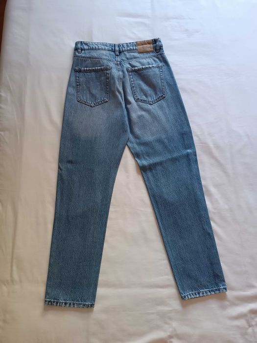 Calças de ganga rasgadas