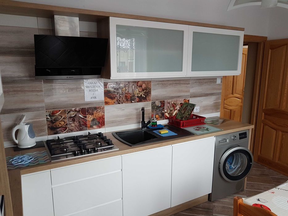 Pokoje i apartamenty z balkonami