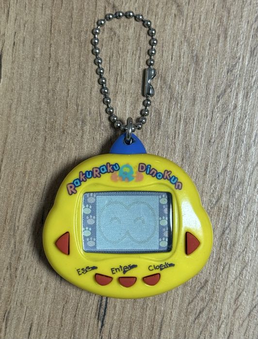 Тамагочи динозавр серии динки Dinkie Dino rakuraku dinokun tamagotchi