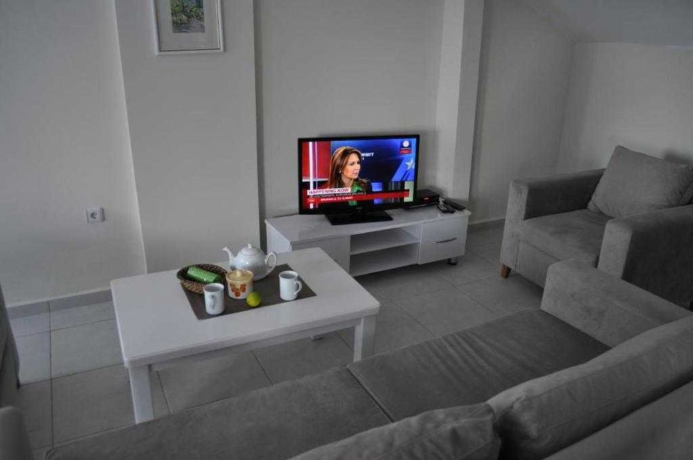 Аренда апартаментов 2+1, 90 м.кв. Личный сад с барбекю.Олюдениз,Турция