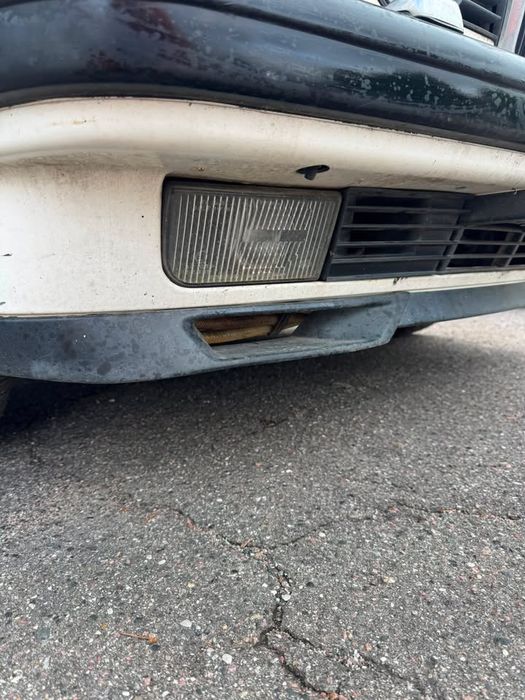 Бампер BMW E32 з омивачями