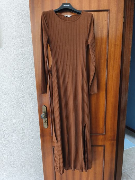 Vestido malha elegante e confortável.