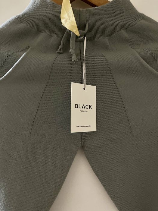 Стильний сірий  універсальний костюм від турецького виробника.