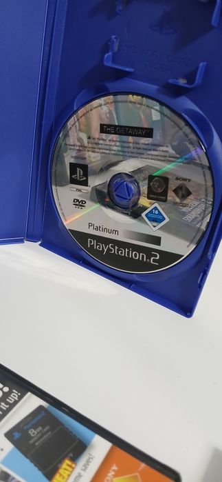 Playstation PS2 com comandos e jogos