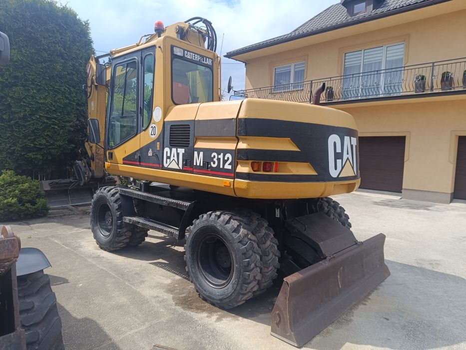 Usługi koparka Roboty ziemne oraz Transport wywrotka.