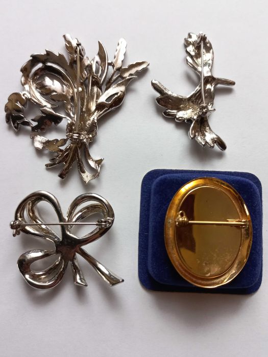 Eleganckie broszki (4 sztuki) - stylizowane, bardzo ładne