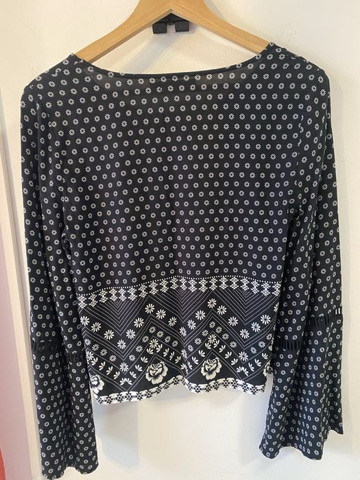 Blusa  estamoada com manga