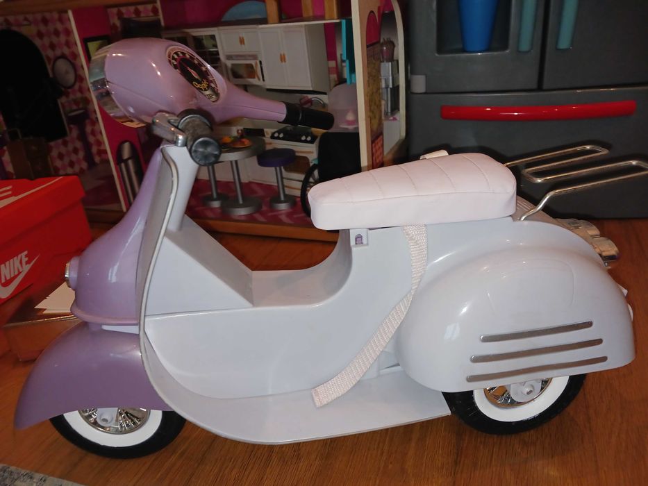 Scooter de bonecas