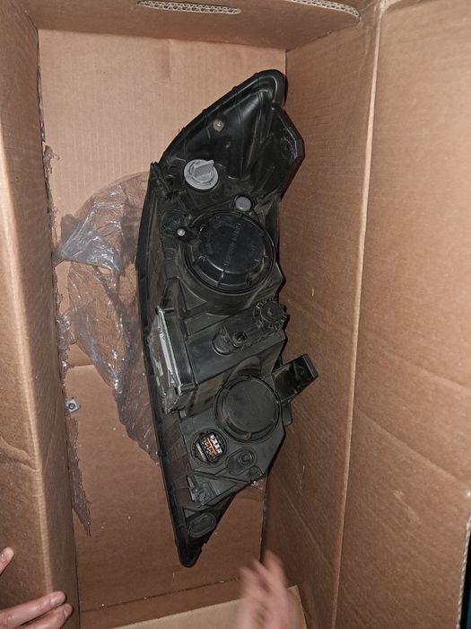 Farol kia sorento 2011