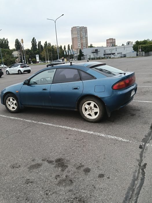 Мазда 323 F BA .