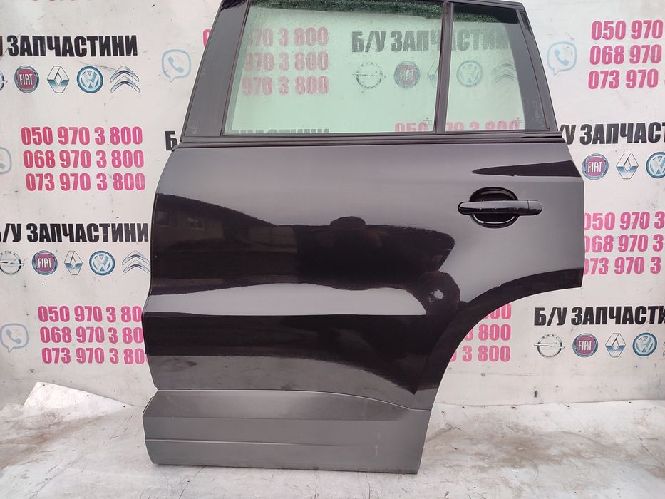 Дверка задня ліва VW Tiguan чорний колір 2011 рік