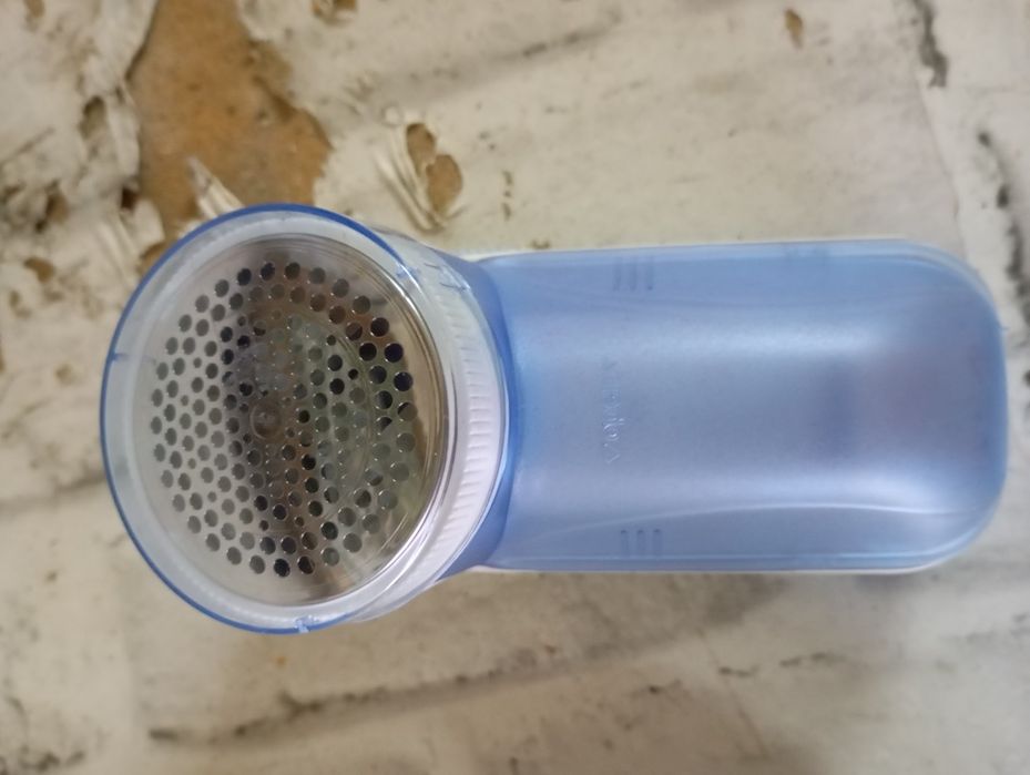 Tira borbotos roupa elétrico NOVO