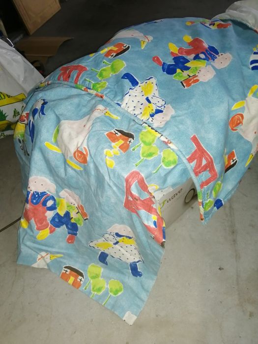 Colcha e reposteiros