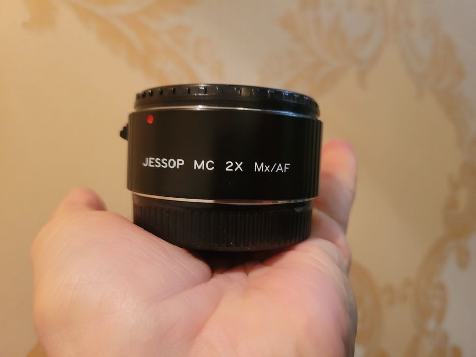 Плівковий зеркальний фотоапарат Minolta 7000af з двома об'ективами