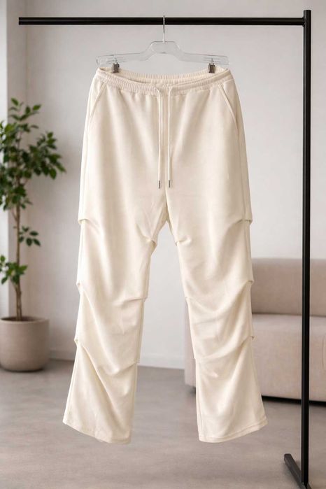 Стильні молочні штани з кишенями (cargo / jogger)