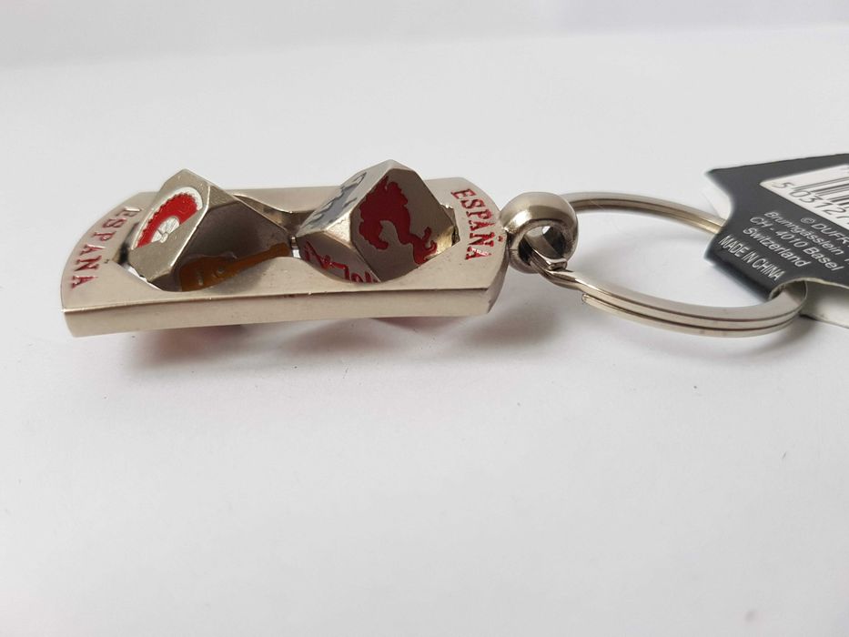 Красивий брелок з поворотними вставками, кубиками, espana
