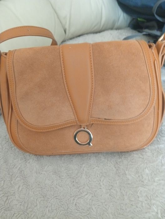 Listonoszka firmy Quazi