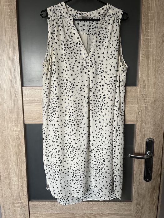 Kremowa zwiewna sukienka na wiosnę/lato, H&M