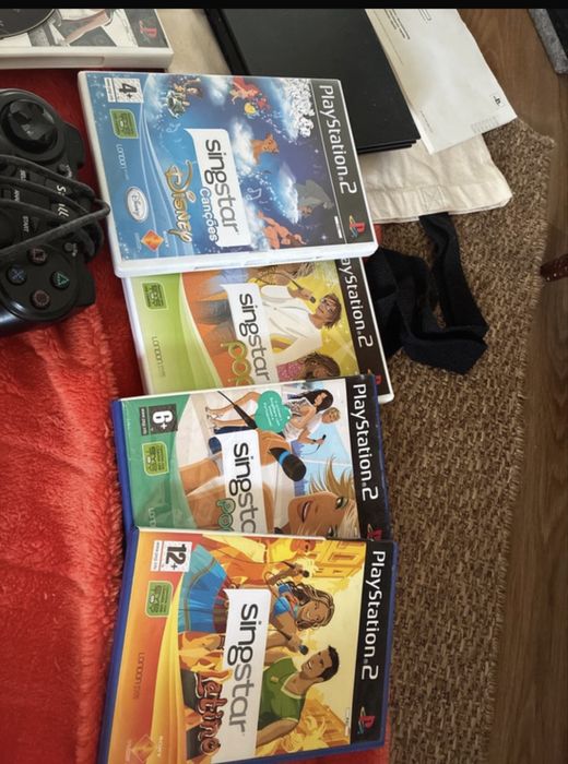 Playstation 2 com comandos e microfones
