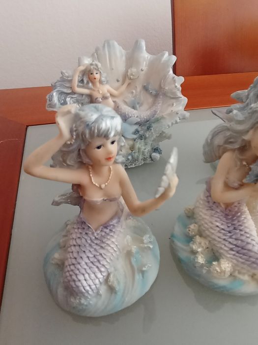 4 estatueta de sereias	novas