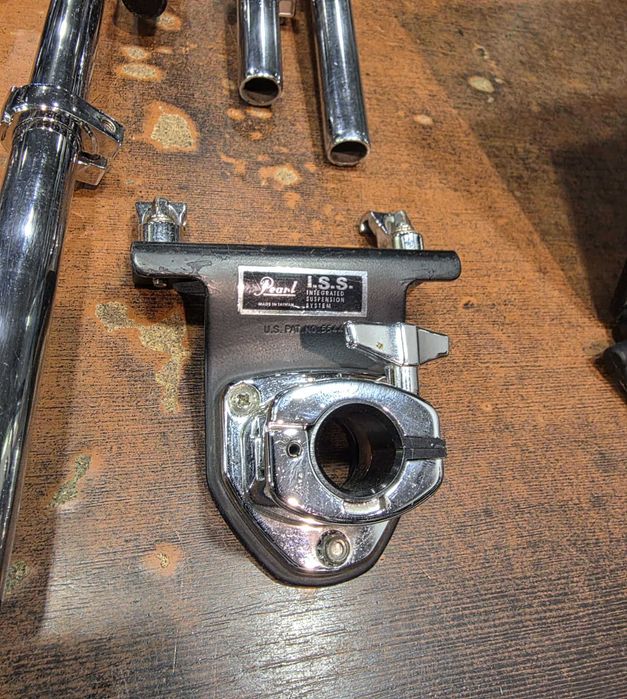 Holdery Pearl unlock system do perkusji