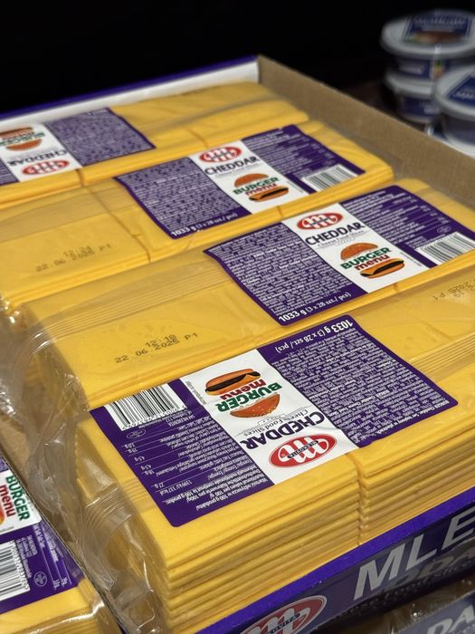 303 грн/шт Сир тостовий chedder mlekovita