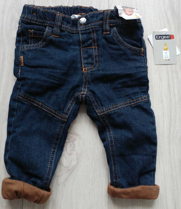 Nowe jeansowe spodnie rozm. 74