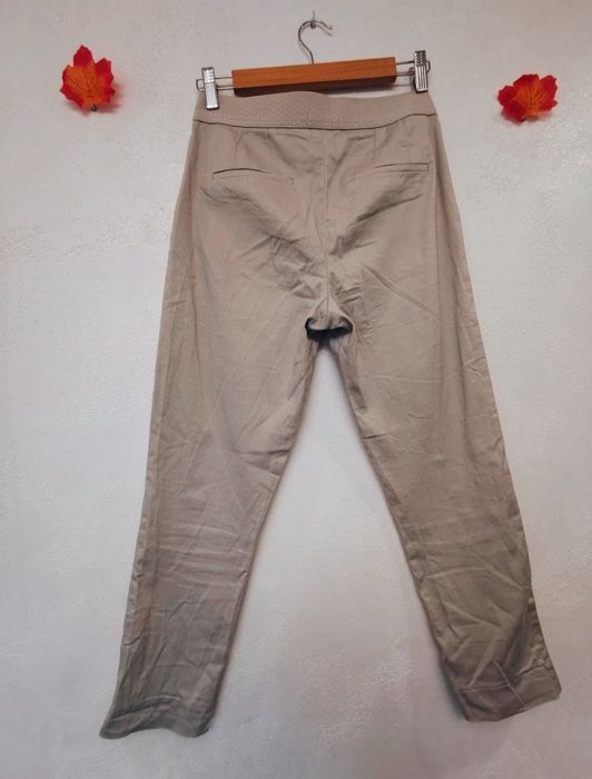 Beżowe bawełniane klasyczne spodnie damskie Orsay