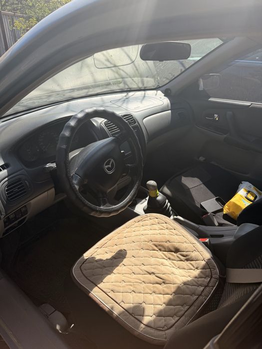 Mazda 323 1998 1.9 бензин
