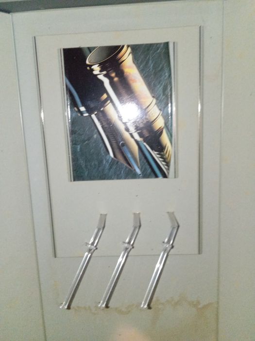 Expositor canetas Parker não sei se funciona a luz