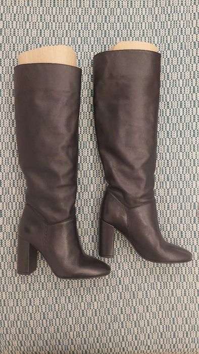 Botas altas pretas de óptima qualidade