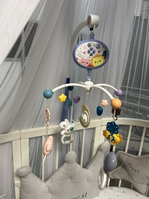 Музичний мобіль на ліжечко з проектором і пультом управління блакитний