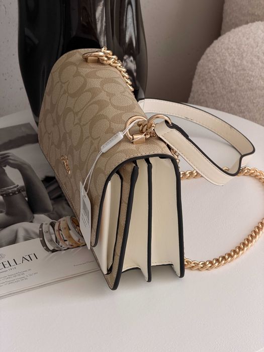 Сумка Coach Mini Klare Crossbody in Signature Canvas через плече Коуч