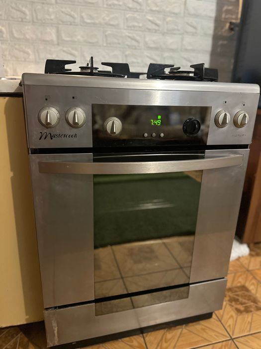 Газова плита з електричною духовкою  «Mastercook”