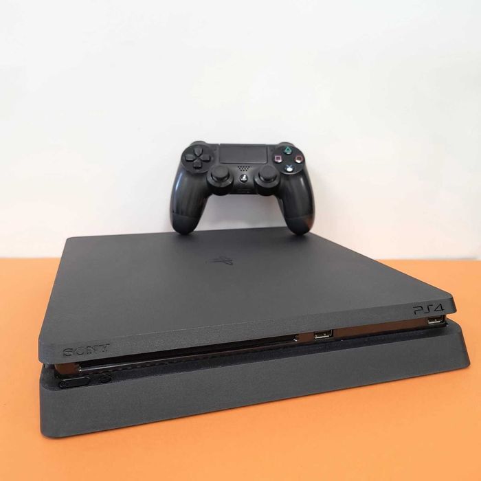 PS4 Slim 1TB Desbloqueada + GTA 5 + 3 Jogos + 1 Comando Novo + Cabo