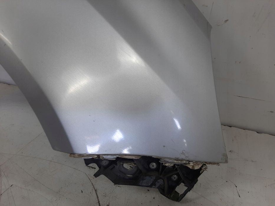 opel corsa d 1.0 12v 3d 06r blotnik prawy przod kod z157