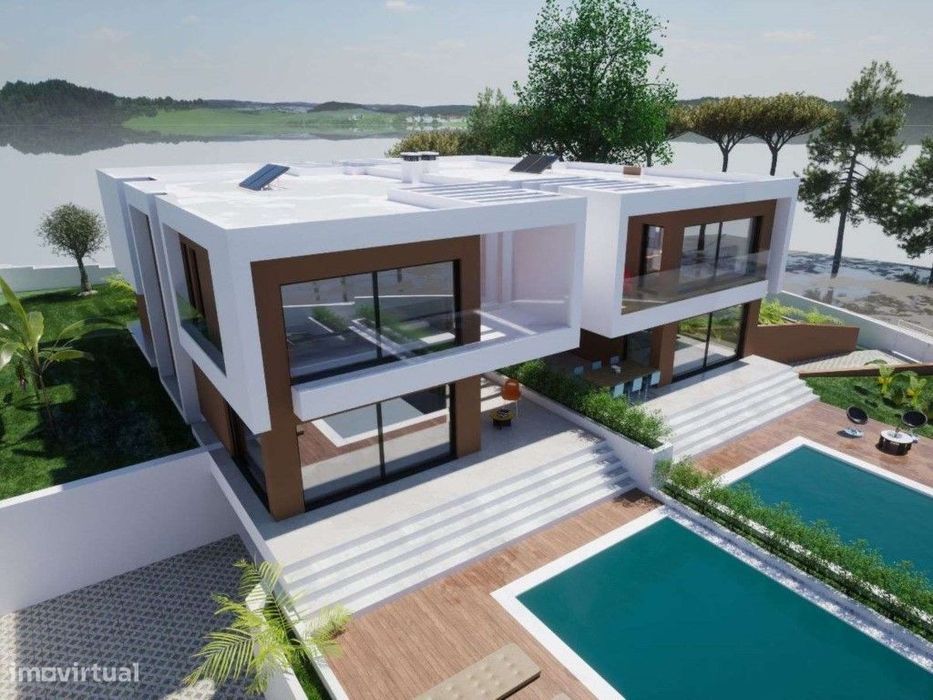 Moradia geminada T4+1 com vista sobre o Rio Sado em Tróia
