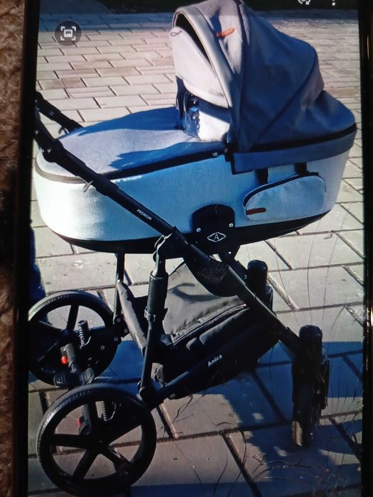 Дитяча каляска + автокрісло.