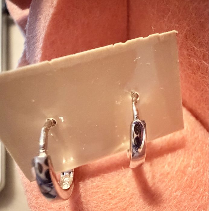 Par de brincos em prata.