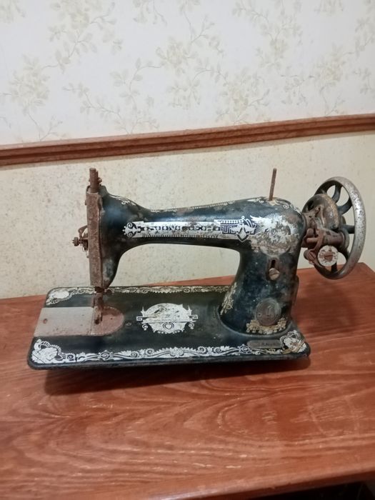 Máquina de costura singer