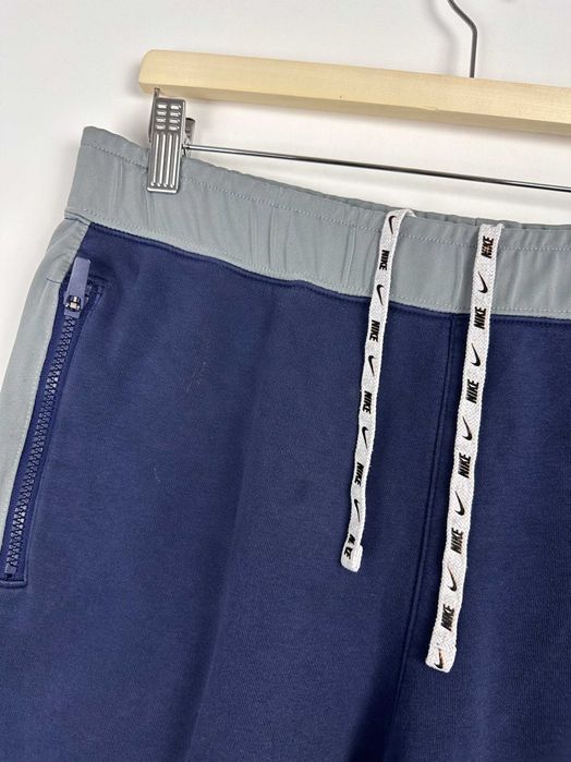 Spodnie dresowe Nike bawełniane granatowe r. L