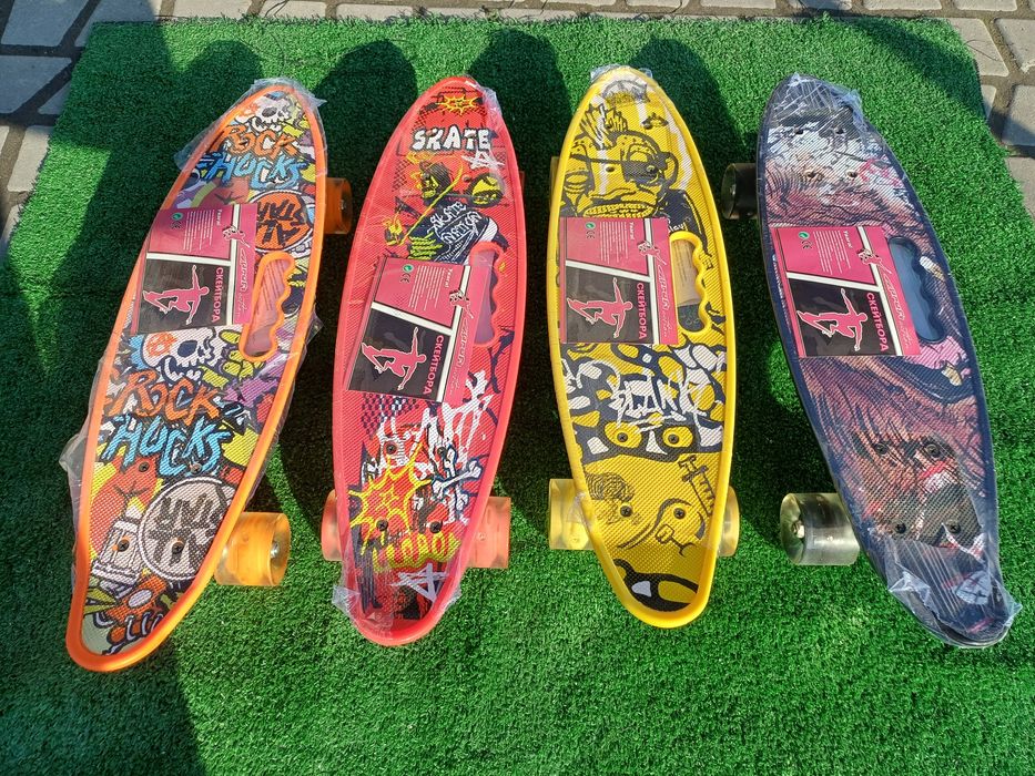 Пеніборди , скейти, шоломи