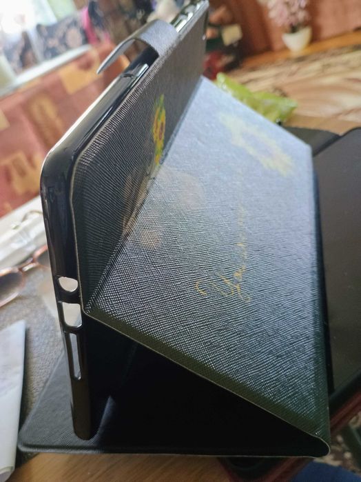 Zapinane etui na tablet